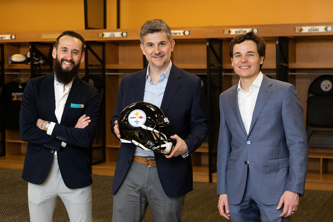 Pictured: Vitro Architectural Glass Vice President of Marketing Fernando Diez (right), Maiz (center) and Sada (right) inside the Steelers locker room at Acrisure Stadium. (Photography: Ray Cordero, Mainline Photography)